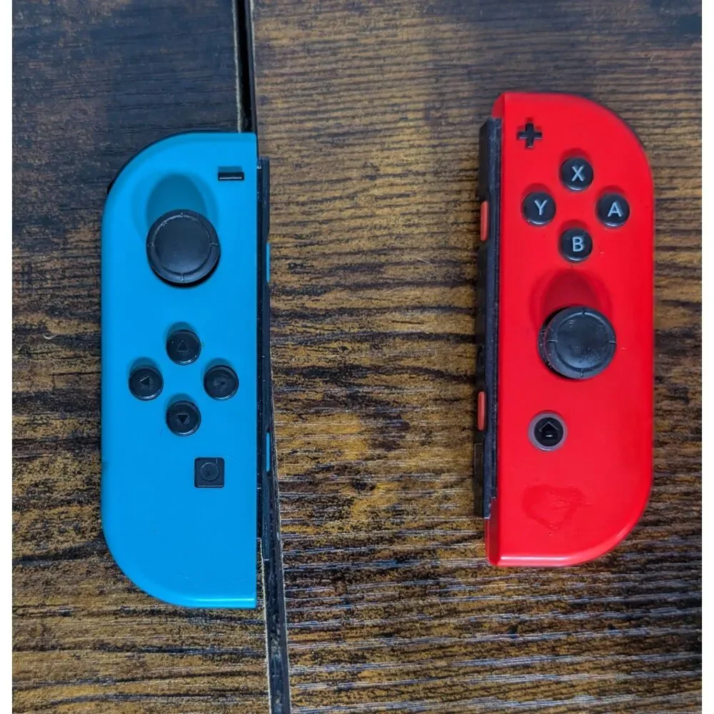 Nintendo Switch Joy-Con Pair Neon Blue Red OEM Genuine Tested Working - Picture 1 of 2